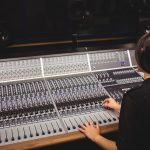 female-student-using-sound-mixer_107420-64832